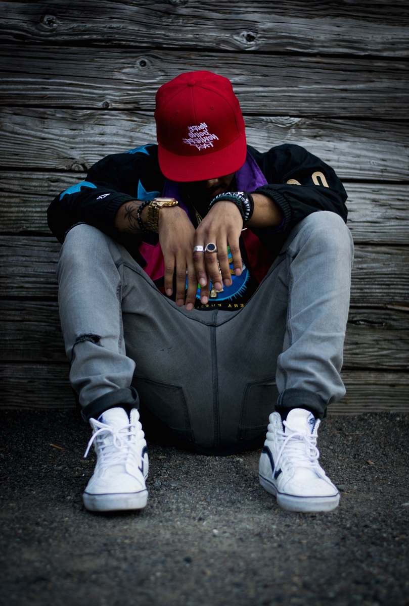 people man wearing grey pants and white low-top sneakers human