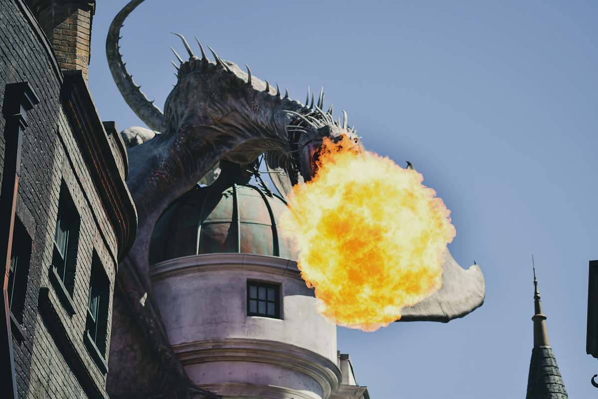 building fire breathing dragon figure on building rooftop orlando