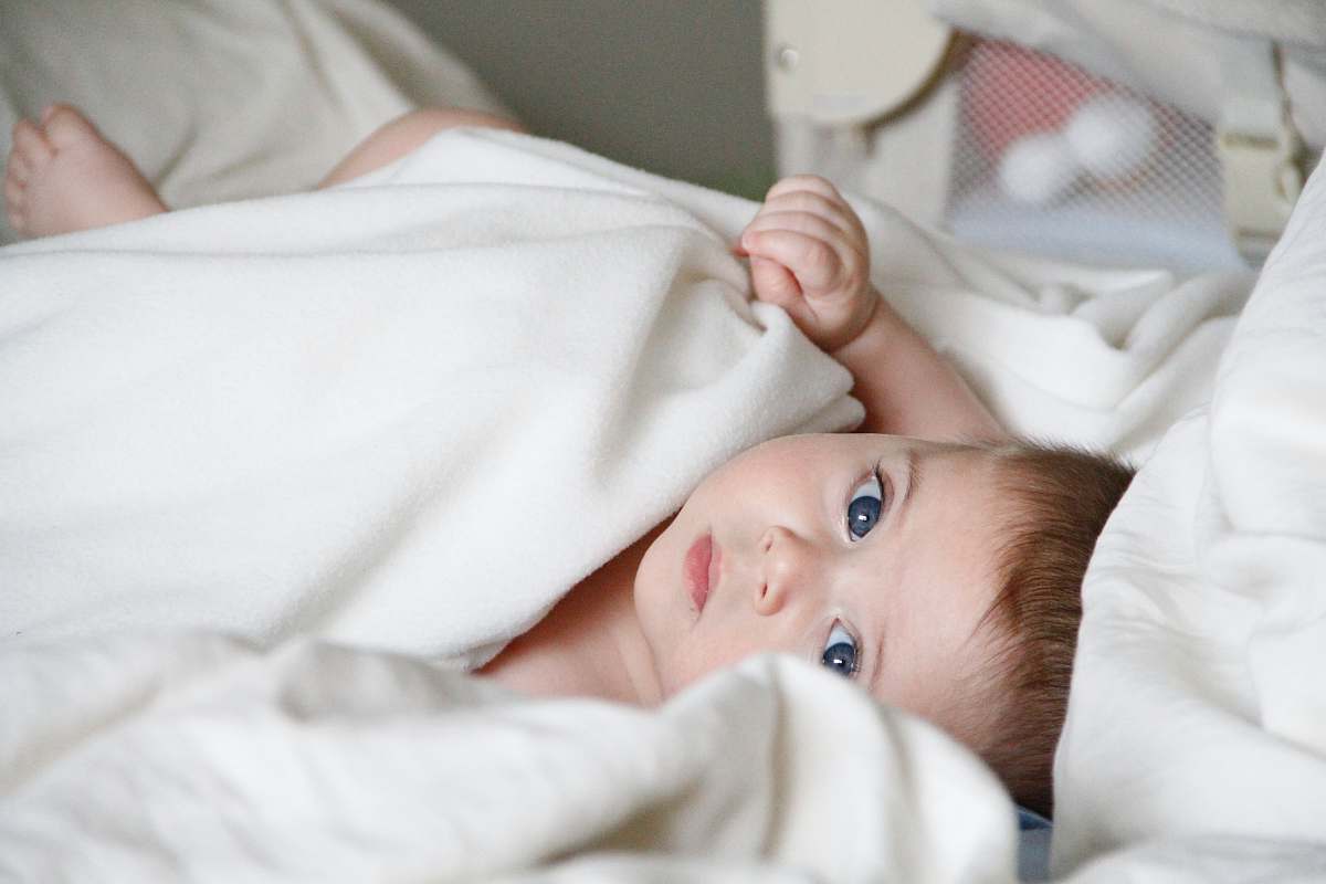 person baby in bassinet people