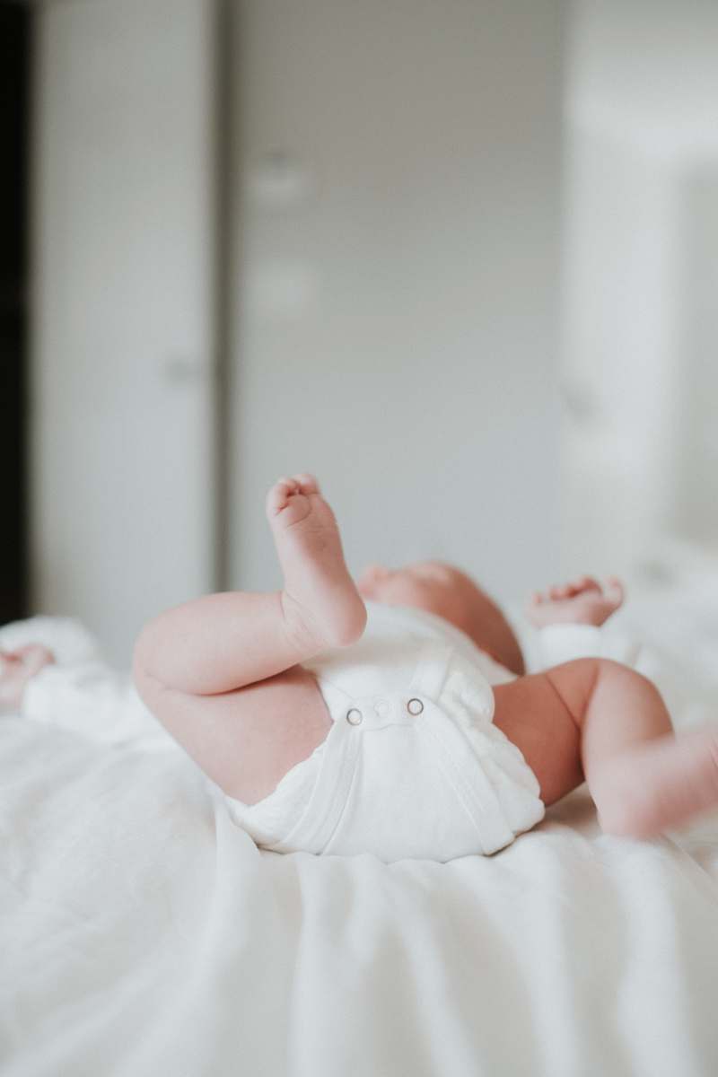 person baby's white onesie human