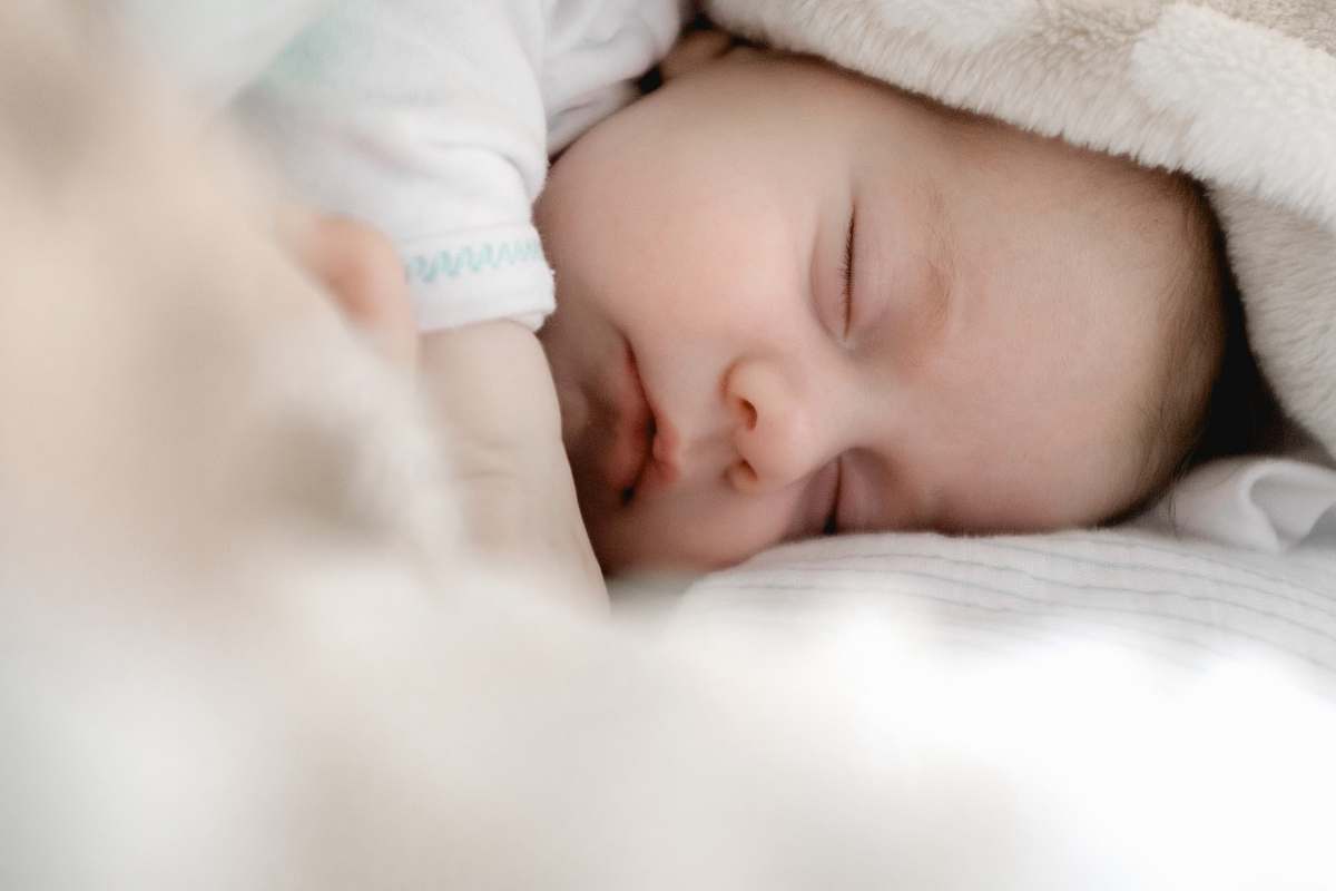 human selective focus photography of sleeping baby sleeping