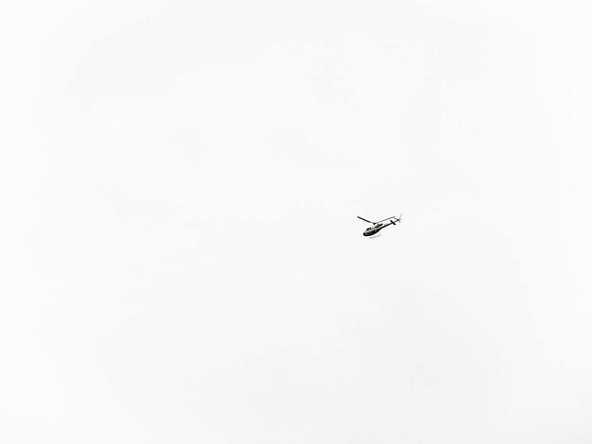 white flying helicopter helicopter