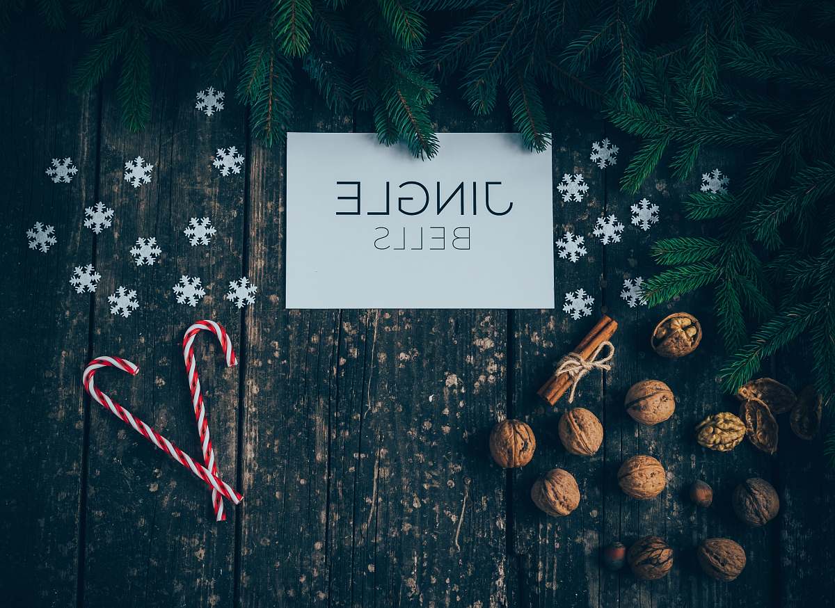 tree Jingle bells sign on flooor plant