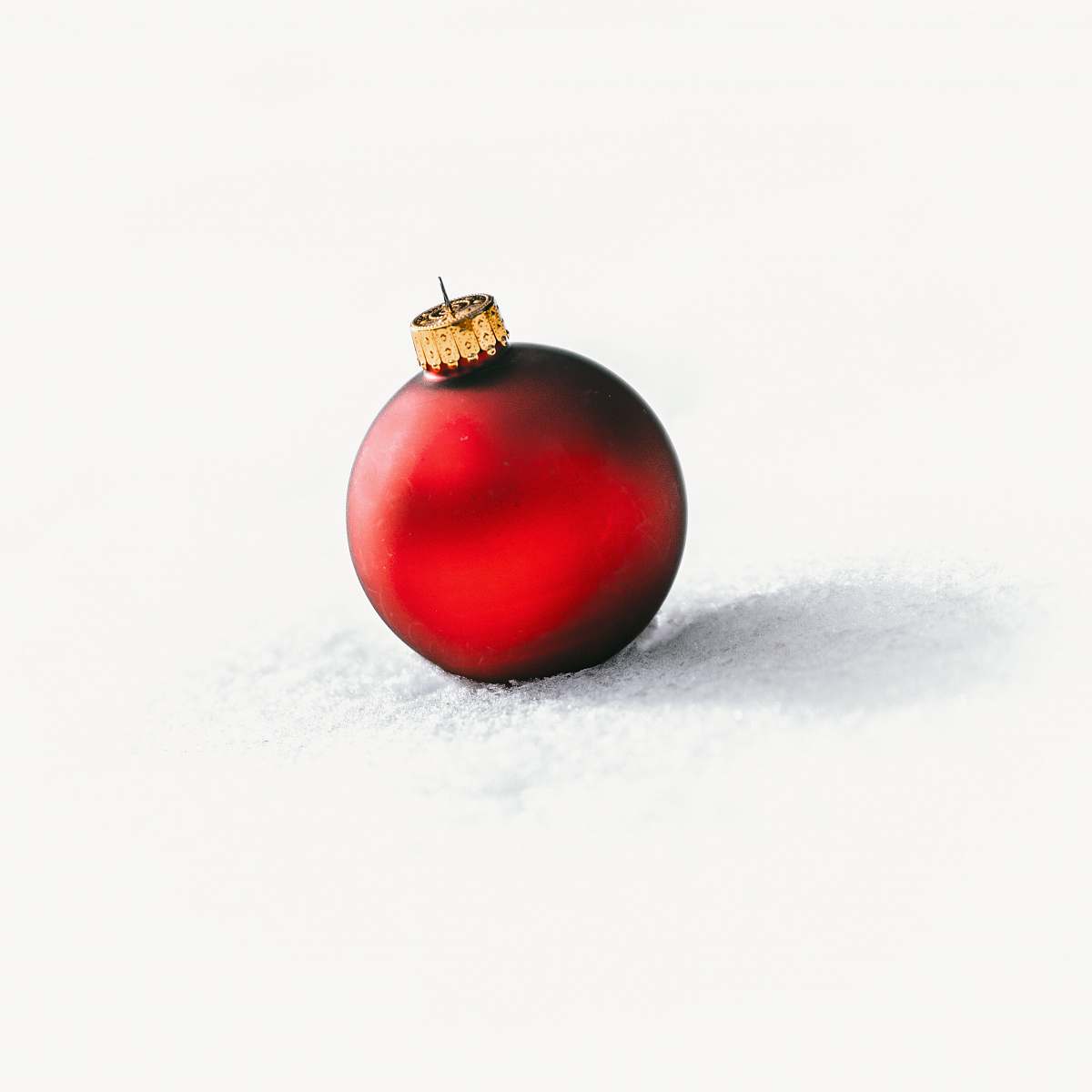 sphere selective focus photo of red Christmas baubles red
