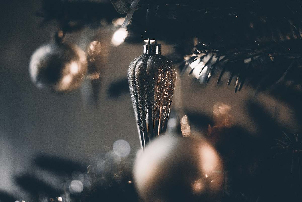 tree shallow focus photography of baubles christmas tree