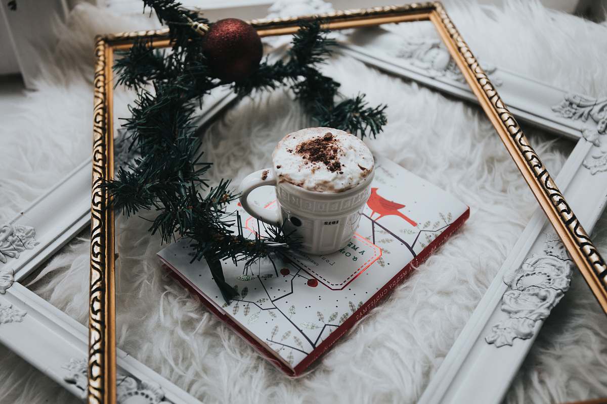 winter white ceramic mug filled with whit mousse food