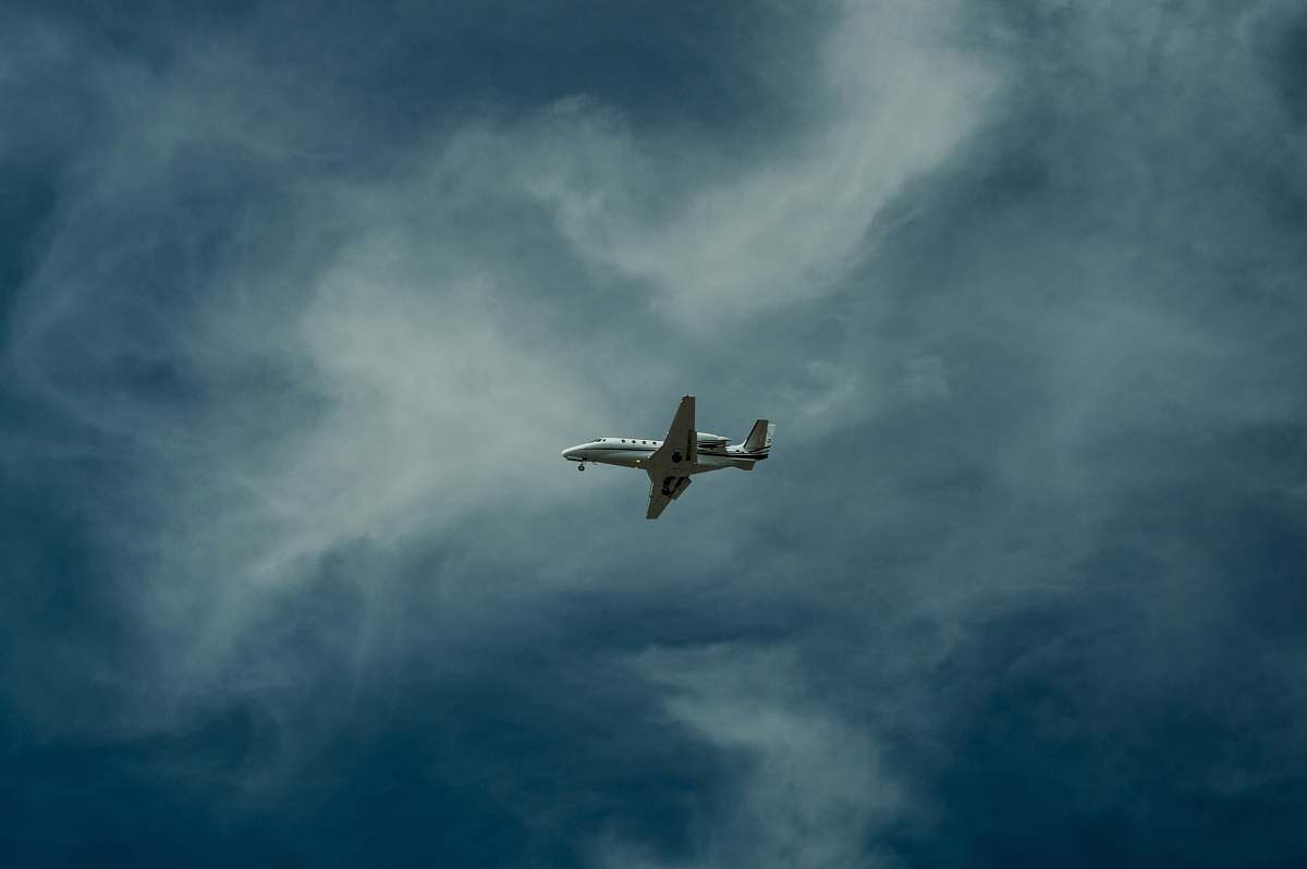 grey airliner on sky photography sky