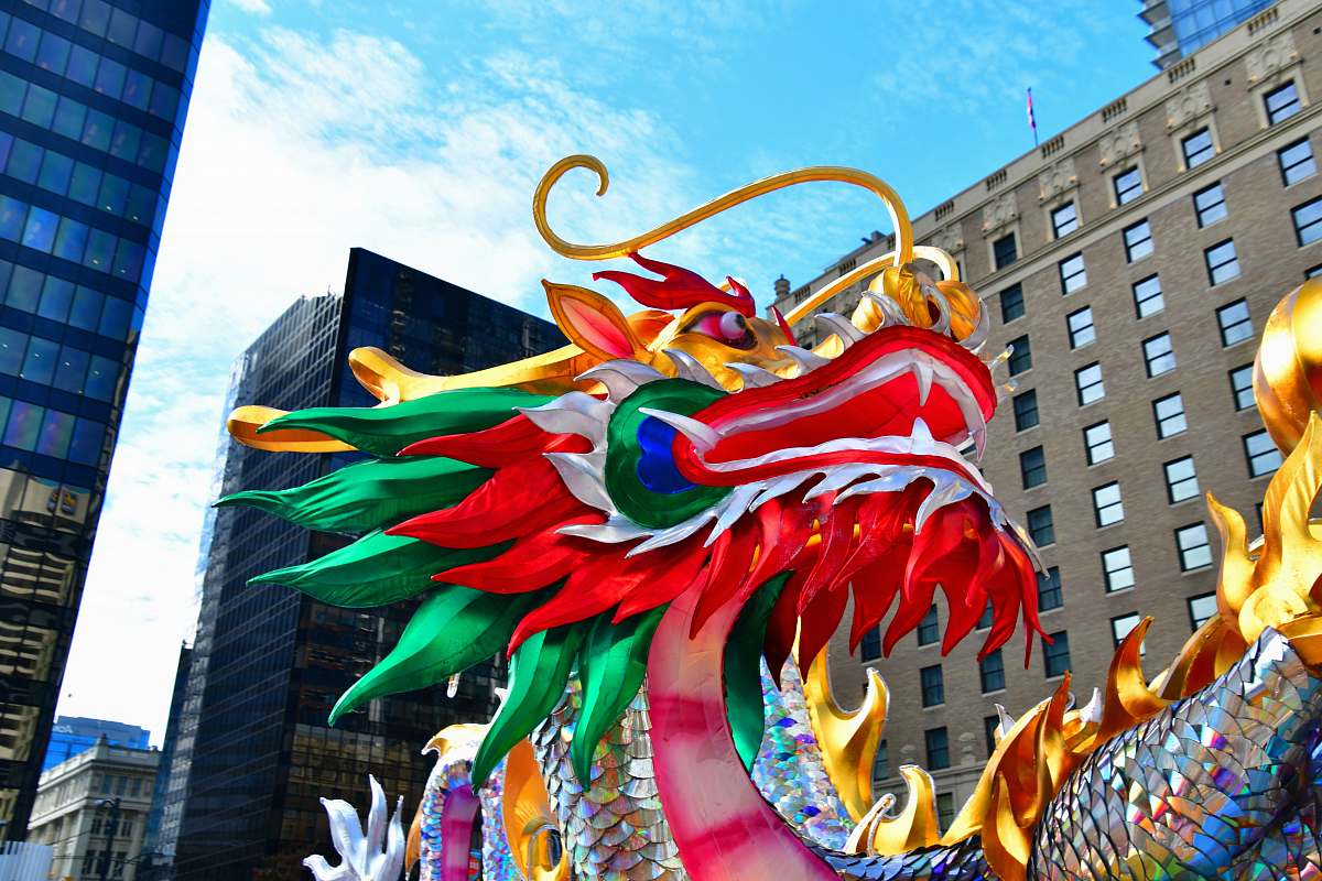 human red and green dragon statue crowd