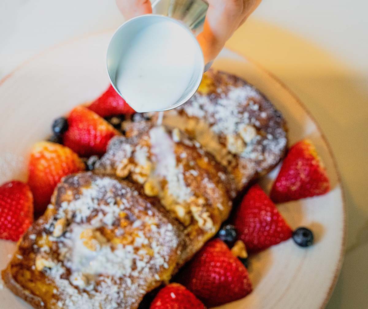 plant breads and strawberries on white ceramic plate fruit