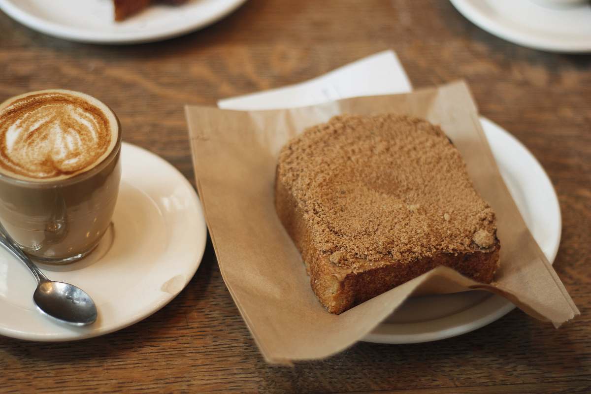 breakfast cake on plate and coffee beverage in cup toast