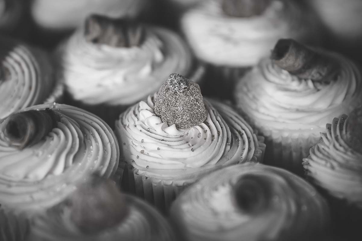 black-and-white grayscale photo of cupcakes grey