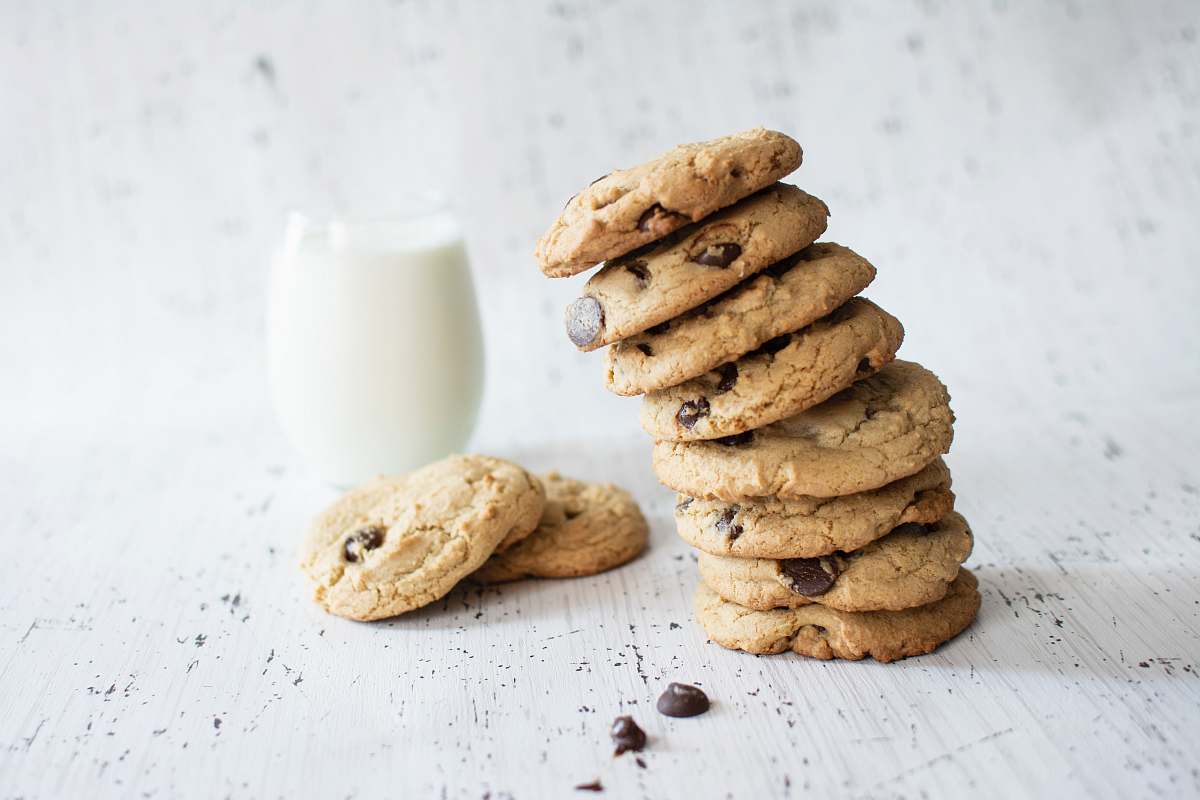 biscuit stack of cookies and glass of milk milk