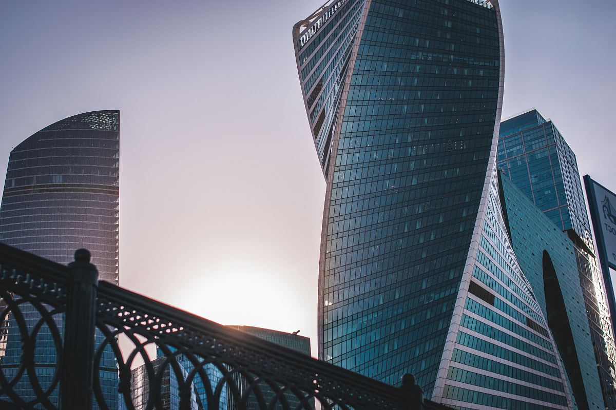 low angle photo of spiral building at daytime