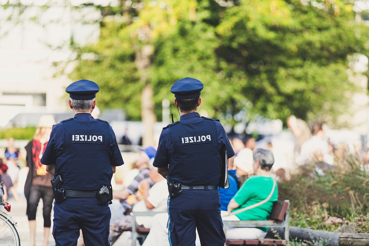 shallow focus photography of police