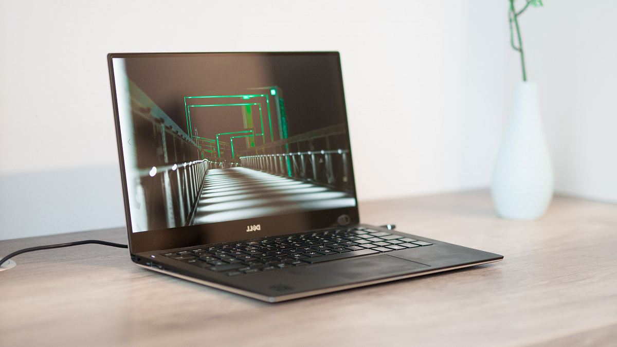 turned-on black Dell laptop computer