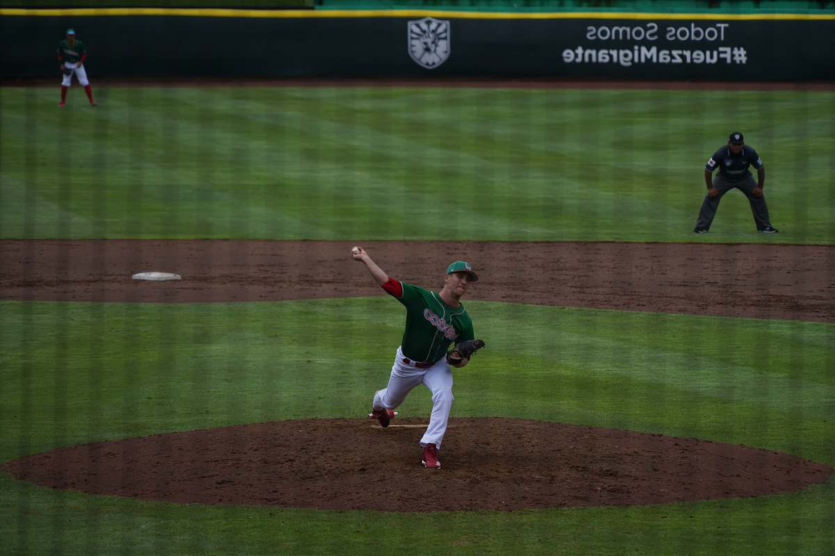 baseball man about to pitch a baseball baseball glove