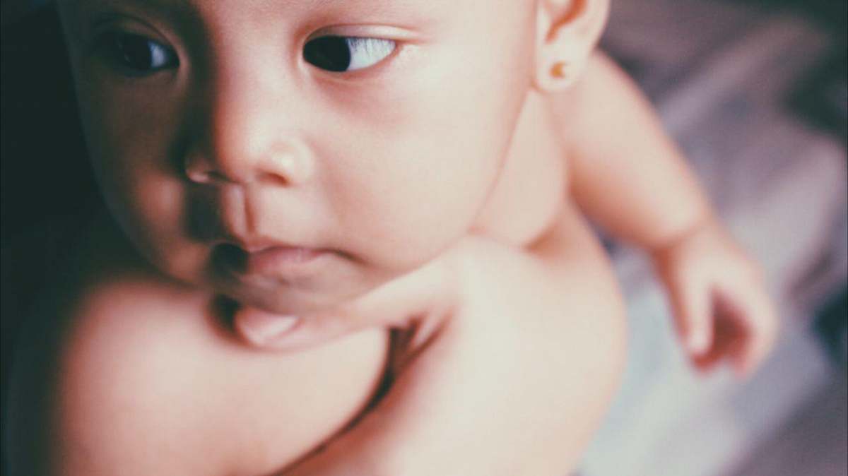 human close-up photography of naked baby people