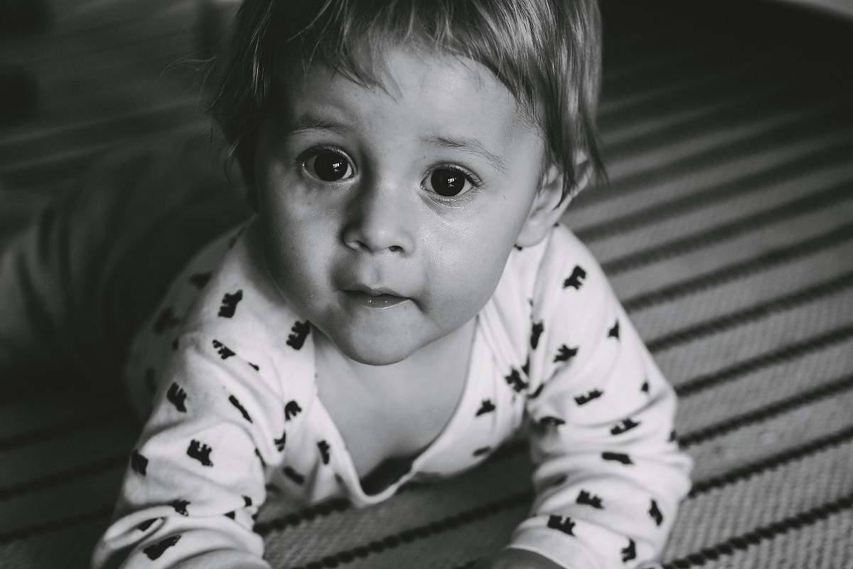 human baby crawling face