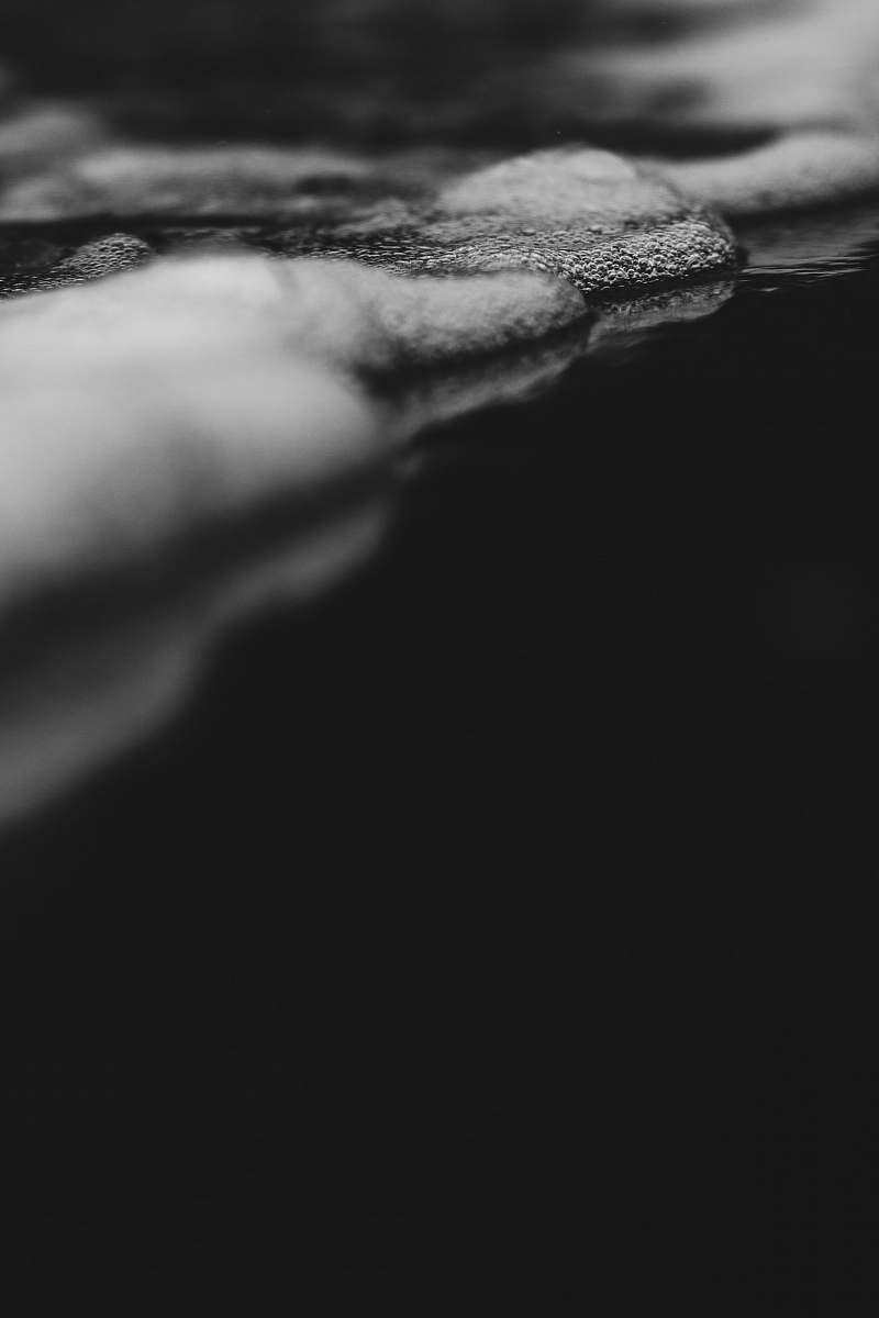 grey grayscale photo of body of water black