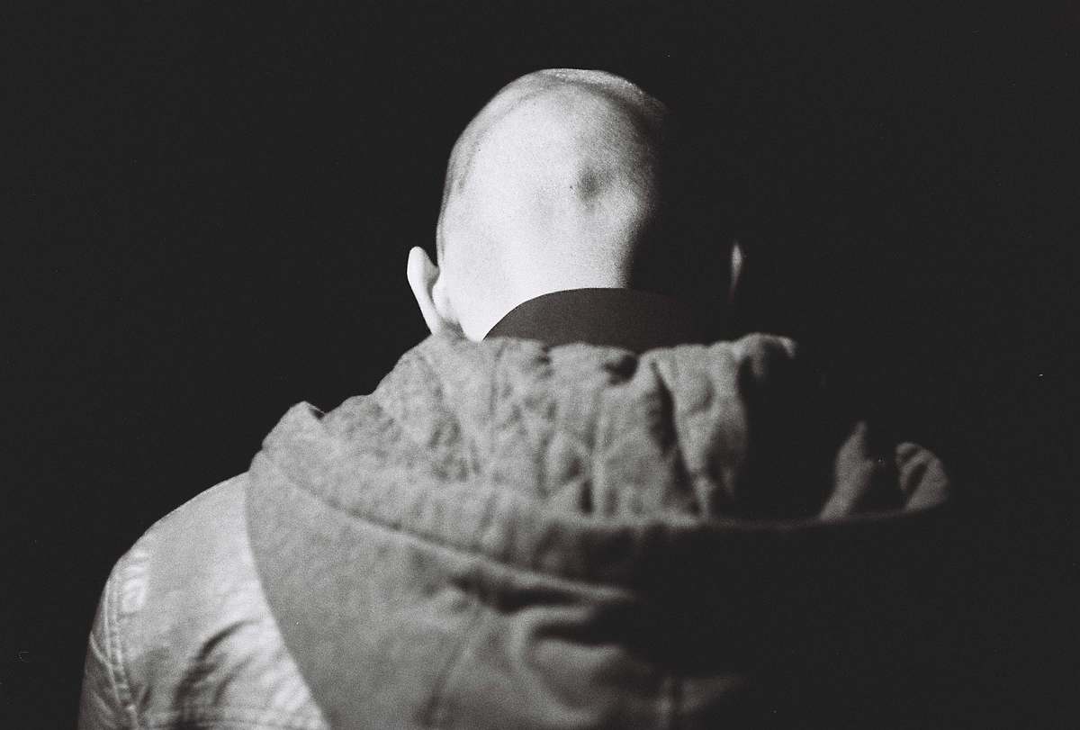 baby grayscale photography of person wearing jacket human