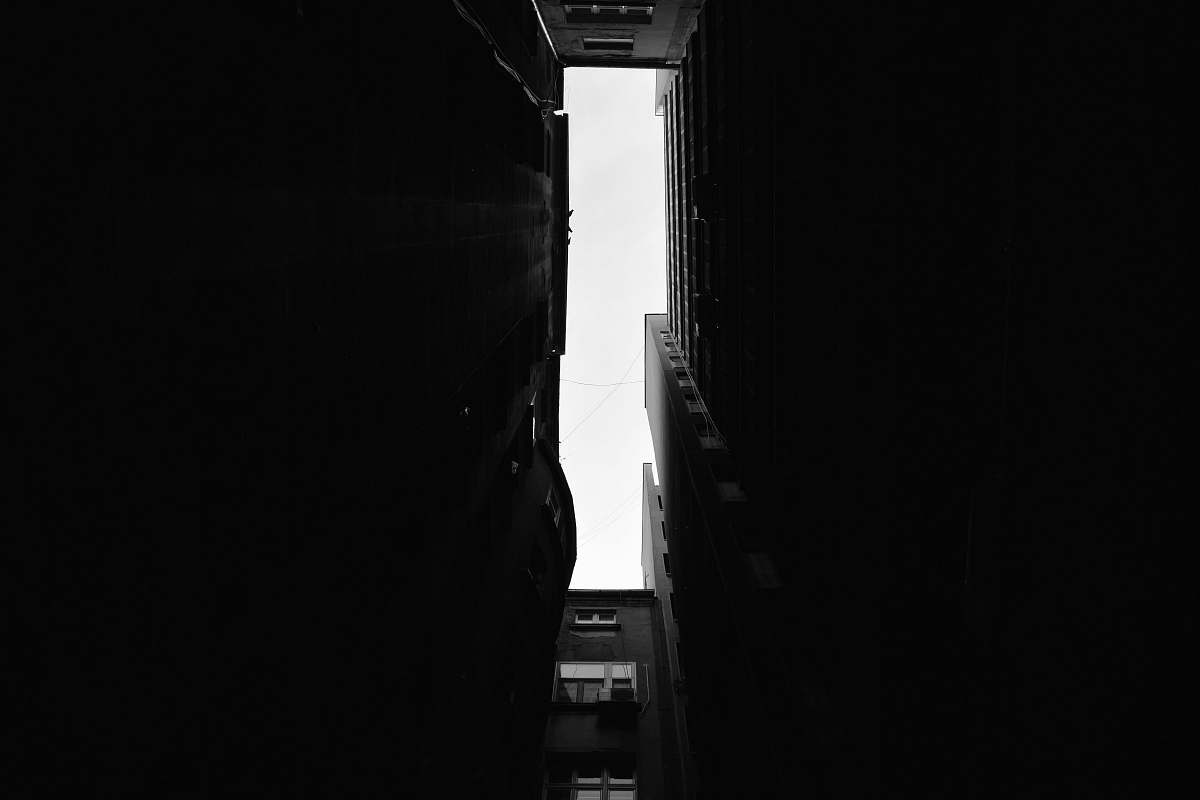 street grayscale photography of buildings black-and-white