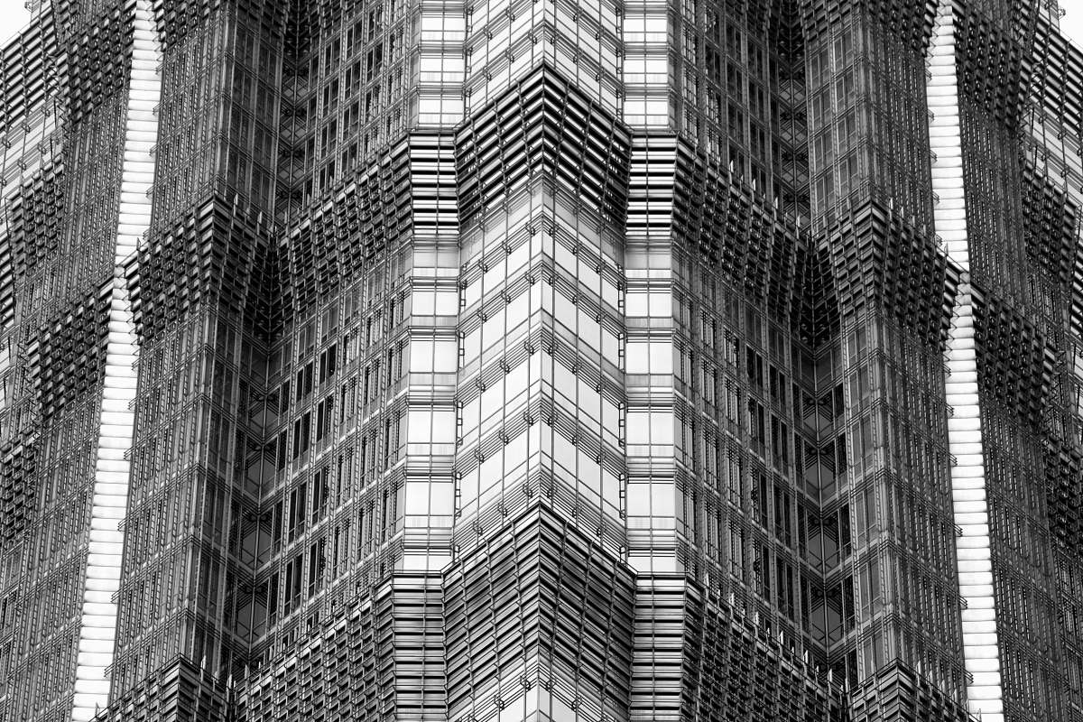 black-and-white high rise building urban