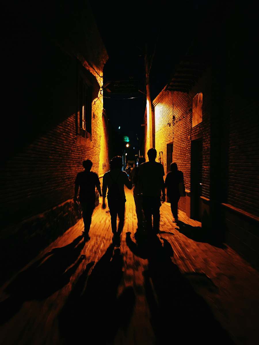 road people walking in alley street