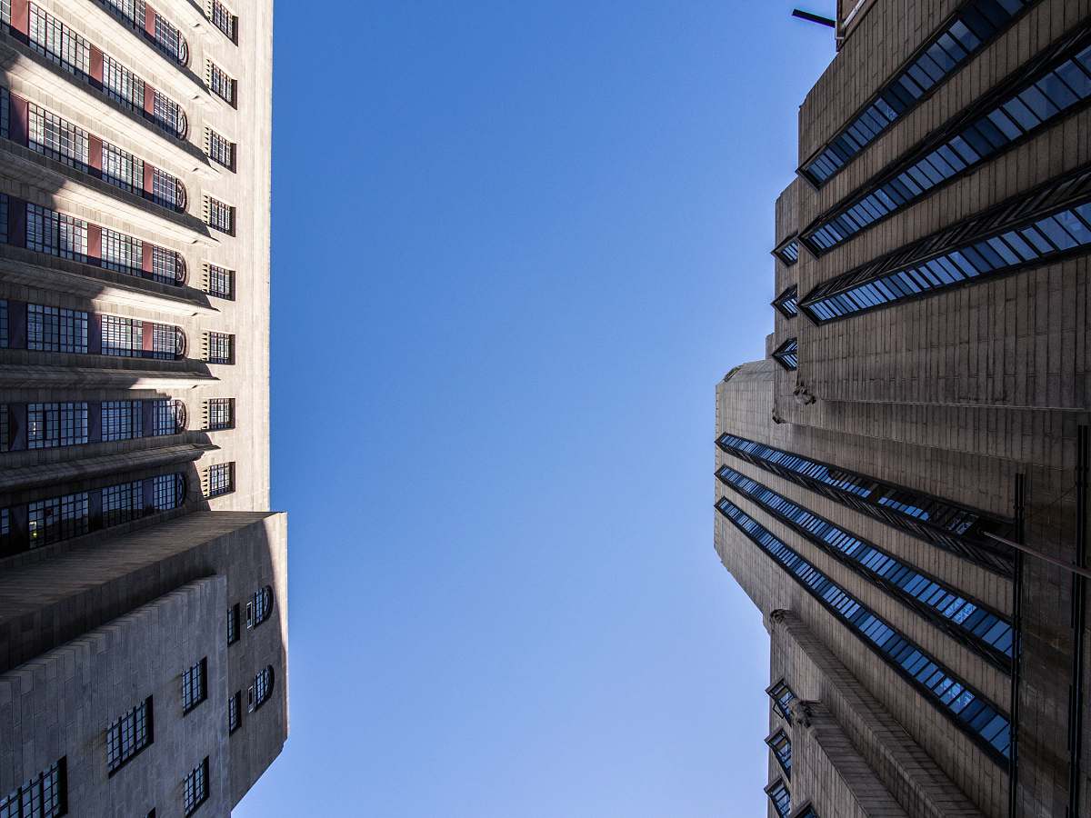 city two white high-rise buildings high rise