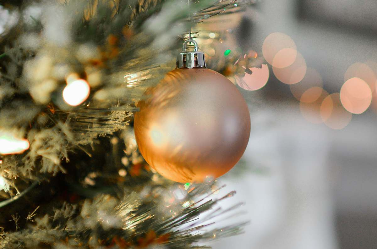 ornament closeup photography of brown Christmas bauble holiday