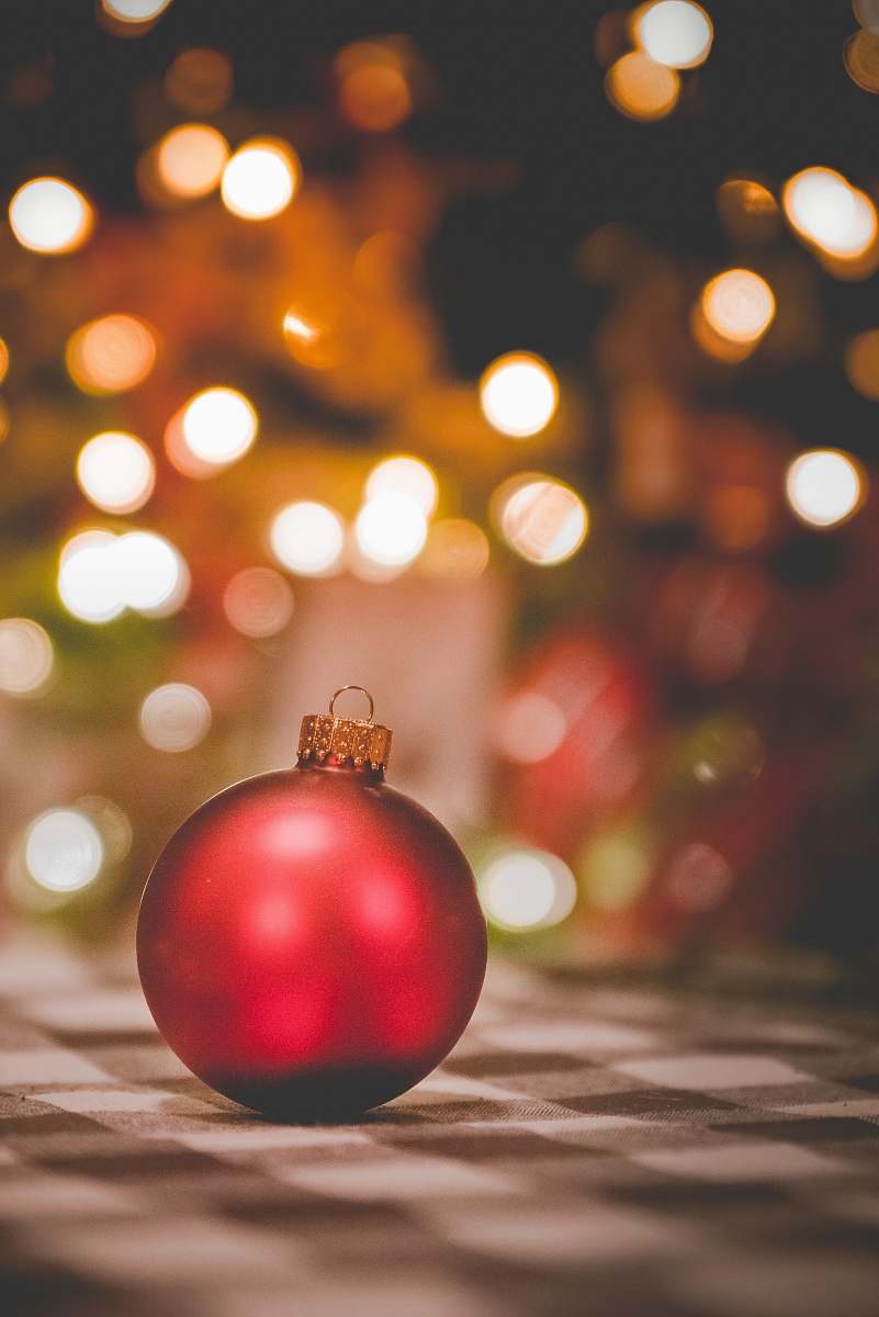 ornament selective focus photography of red Christmas bauble sphere