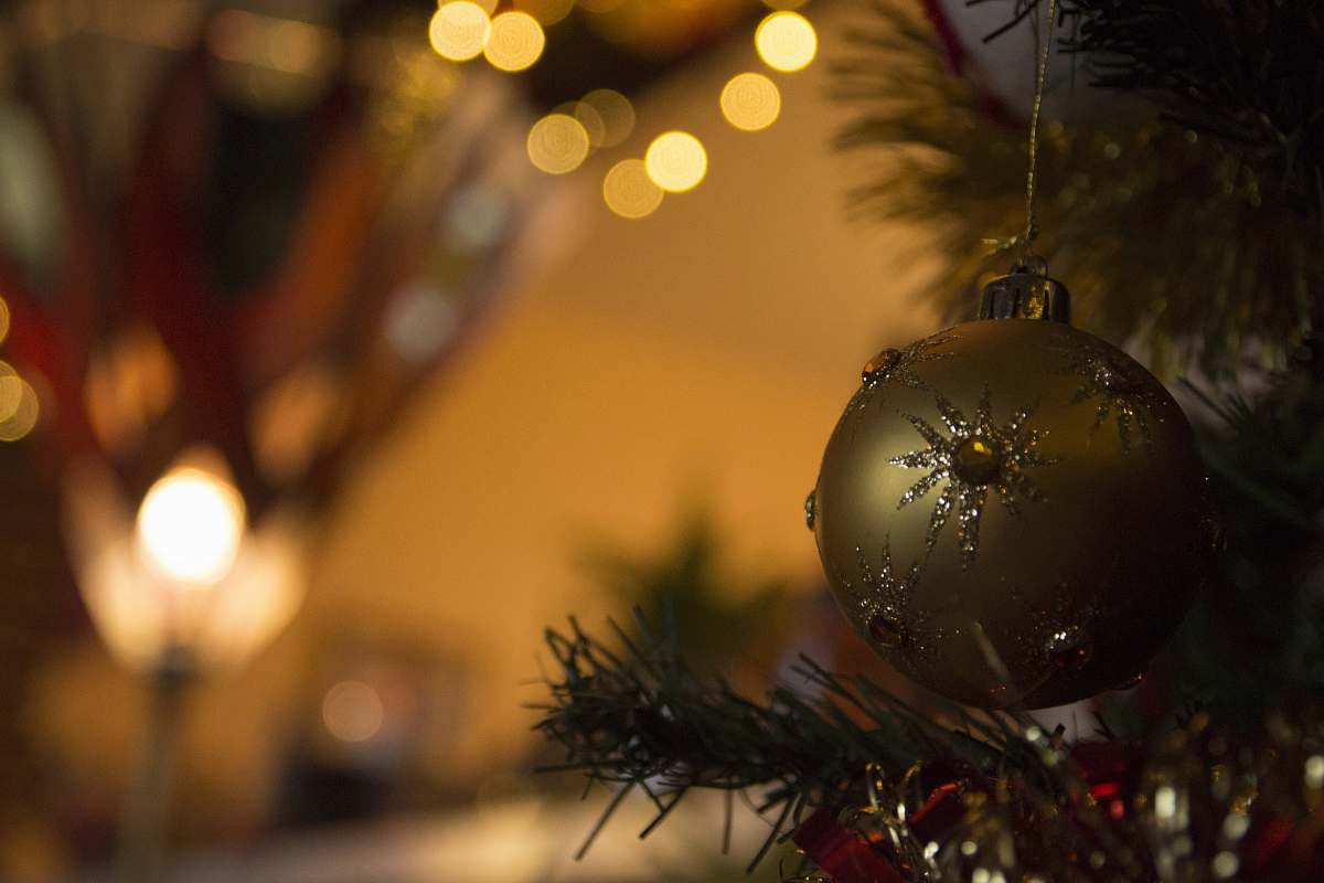 ornament tilt-shift lens photo of gold Christmas bauble brown