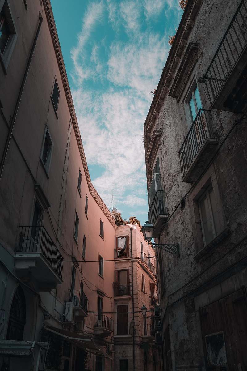 street low angle photo of concrete apartments building