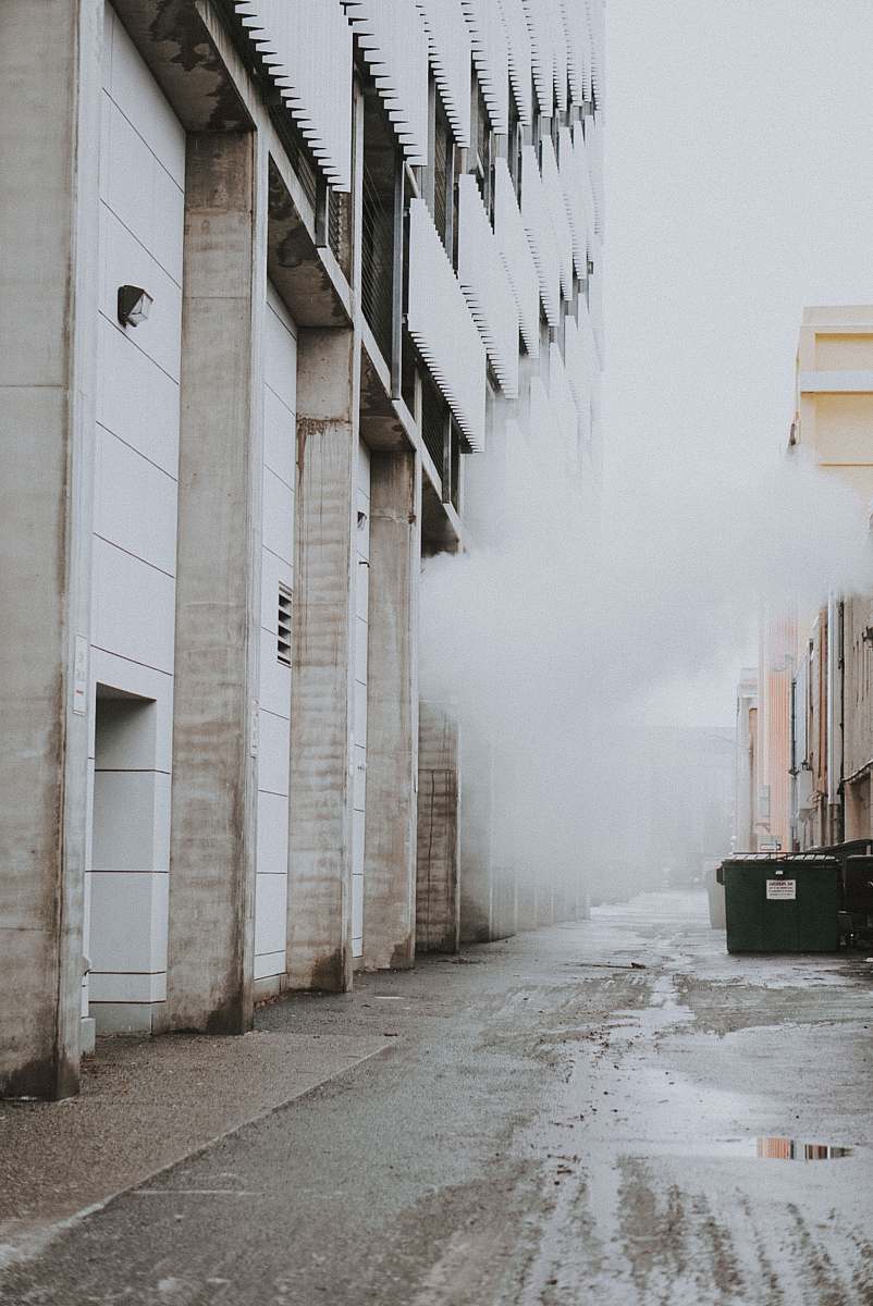 street smoke coming out from building town