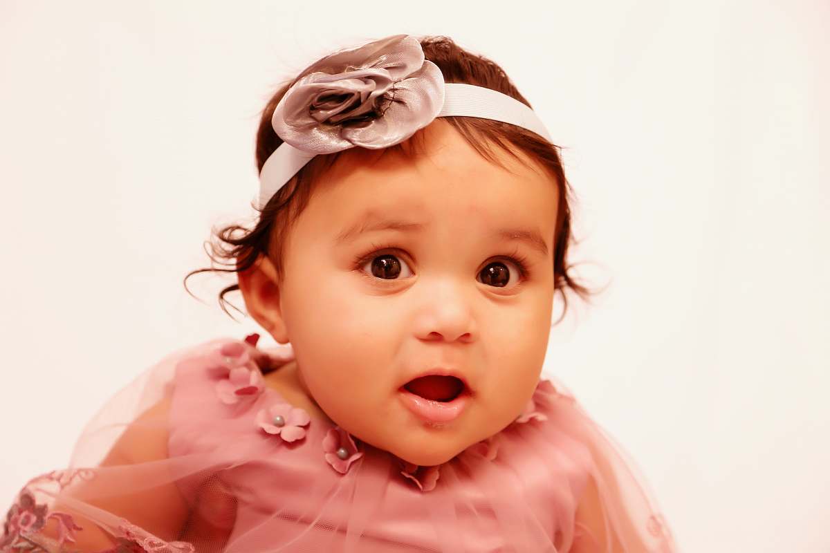 apparel baby's wearing pink lace top hat