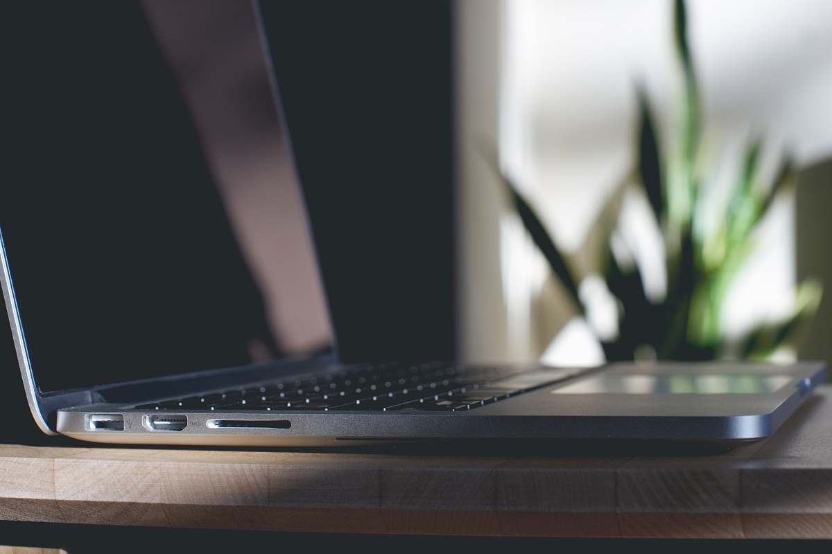 laptop tilt shift lens photography of black laptop computer keyboard
