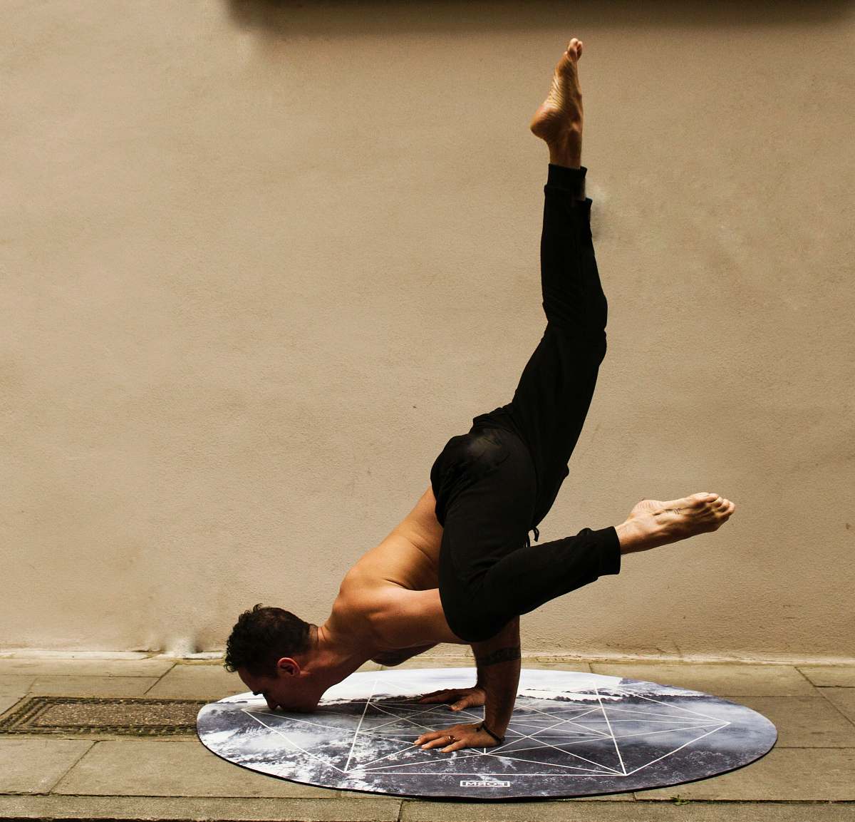 Yoga Man Doing Stunt Near Brown Wall Exercise Image Free Photo