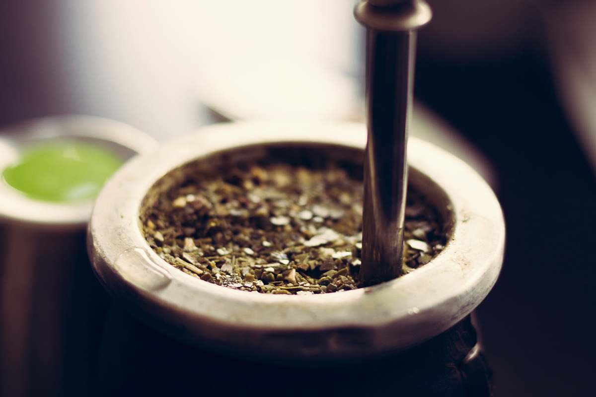 tea close-up photography of container mate