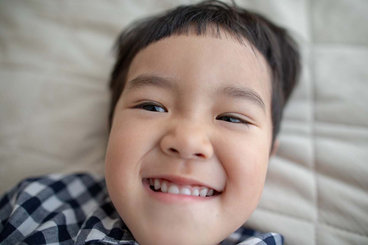 person boy taking selfie face