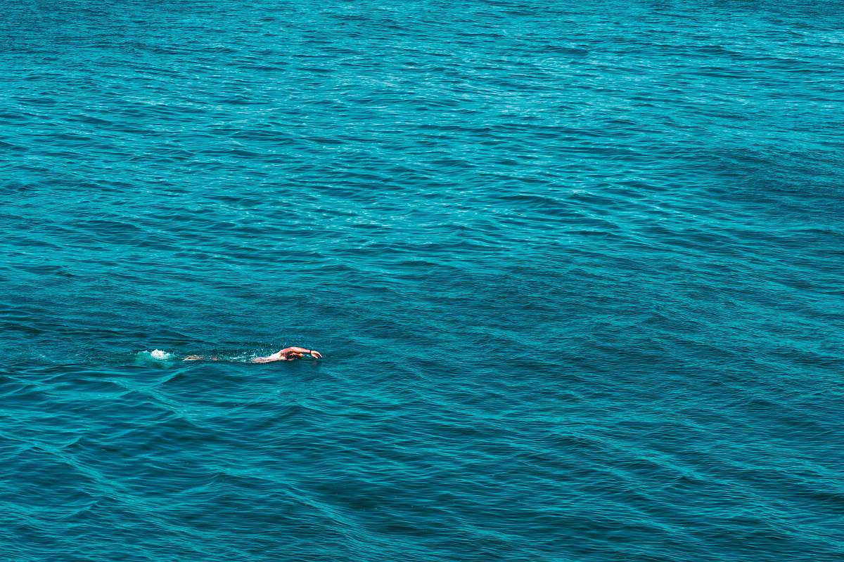 person person on body of water sport