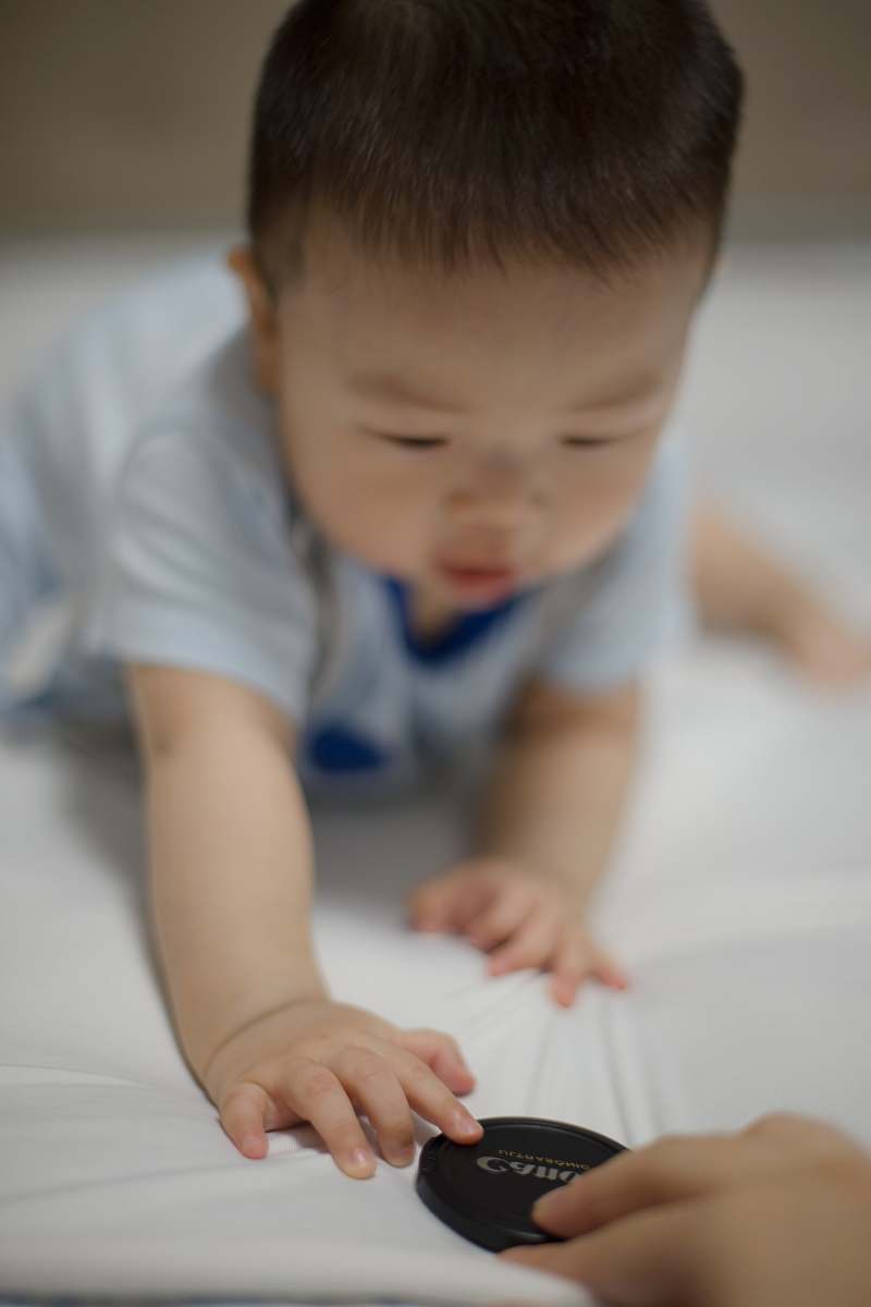 person toddler in blue shirt baby
