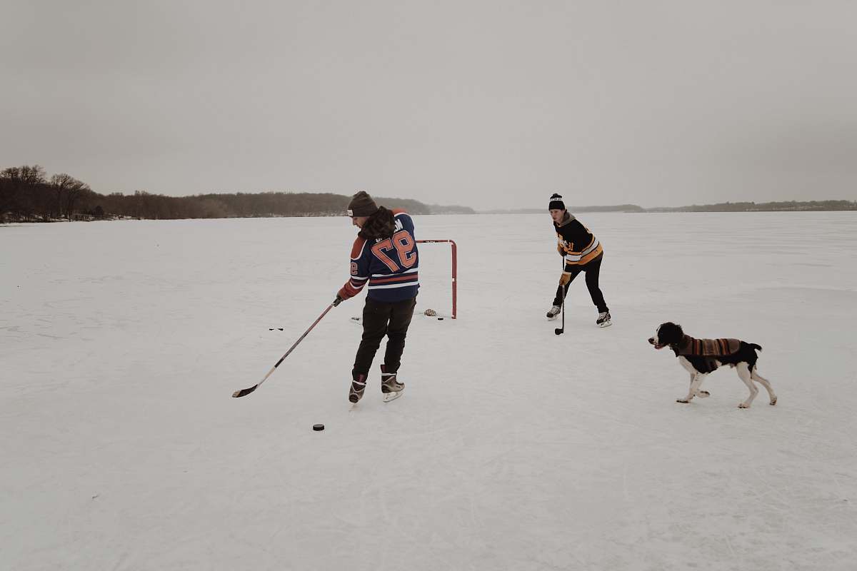 hockey two men playing ice hockey game people