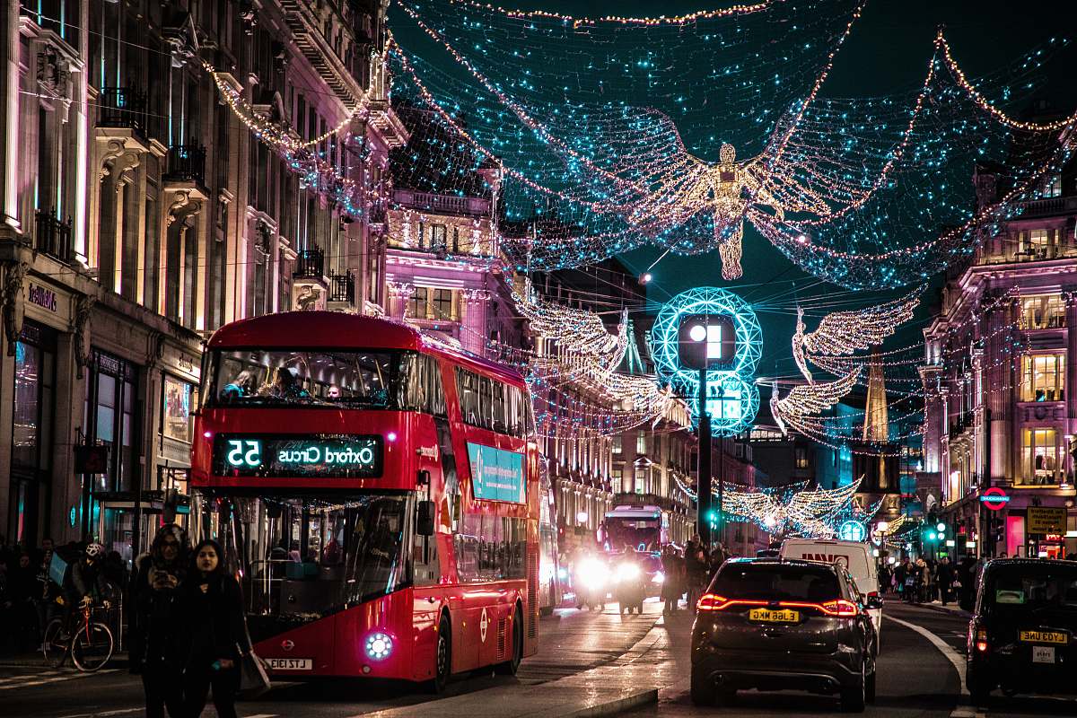 vehicle photo of bus passing on city with lights urban
