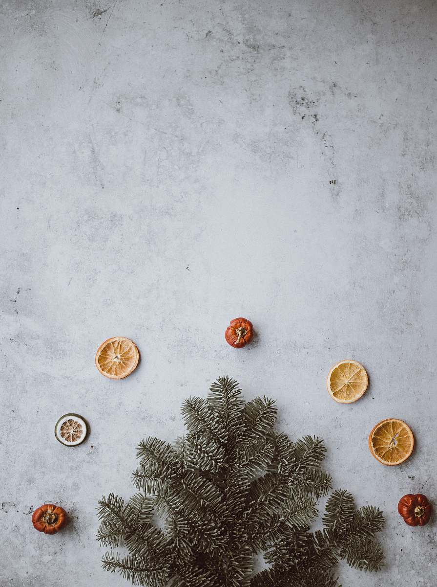 coin sliced orange fruit and bell peppers grey