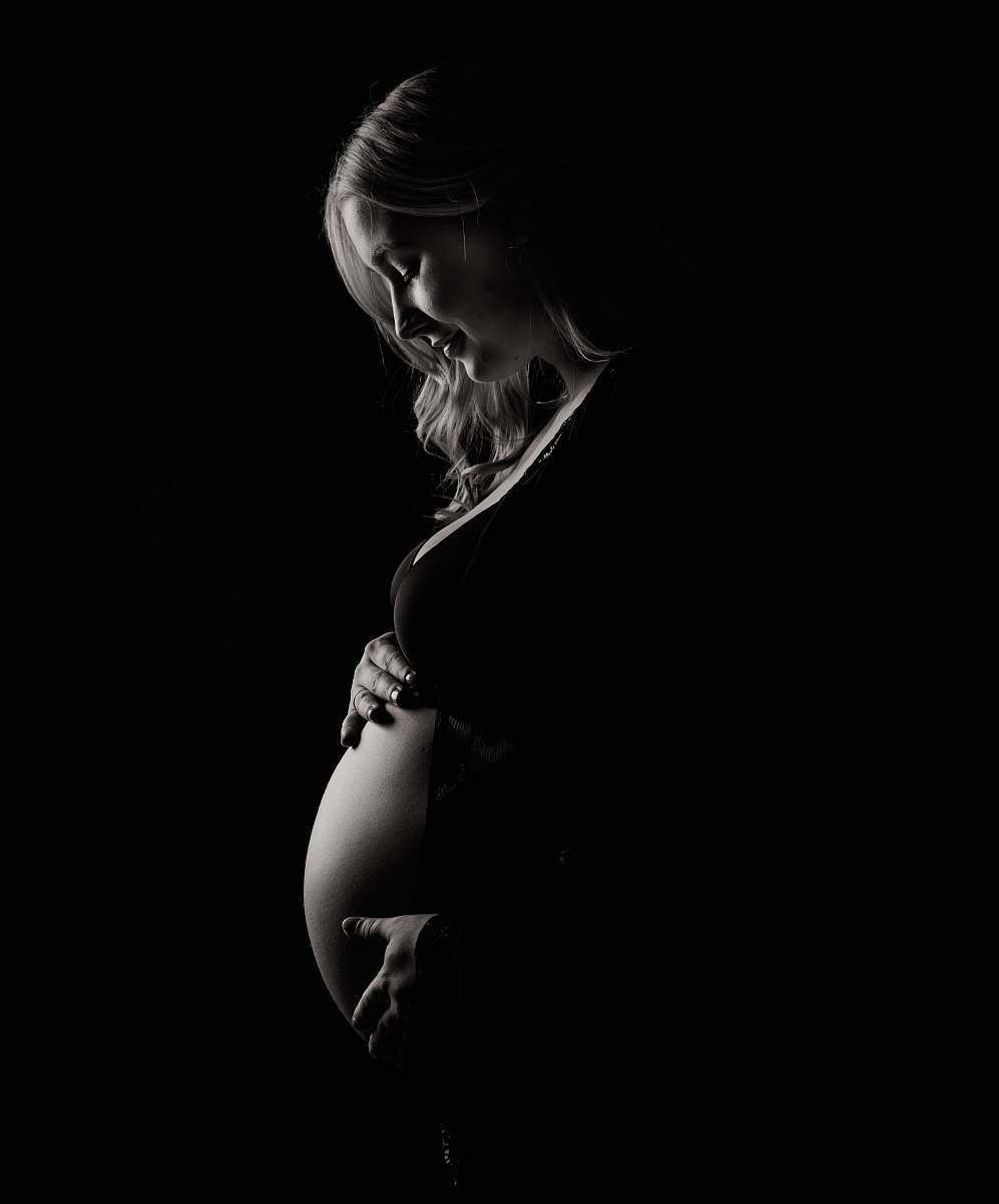 pregnancy pregnant woman holding tummy woman