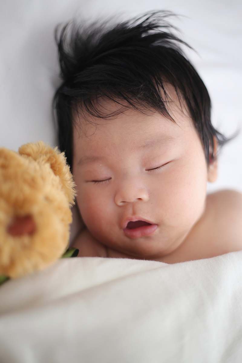 baby baby sleeping on pillow newborn