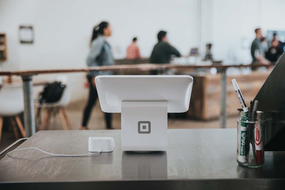 human monitor on desk furniture
