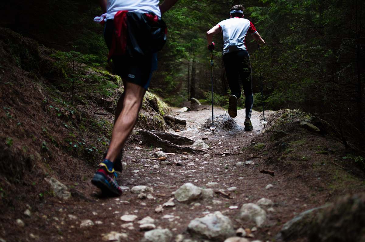 people two people running forest