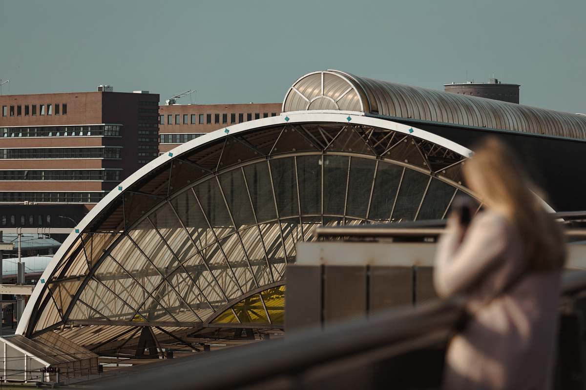 human woman standing near building architecture