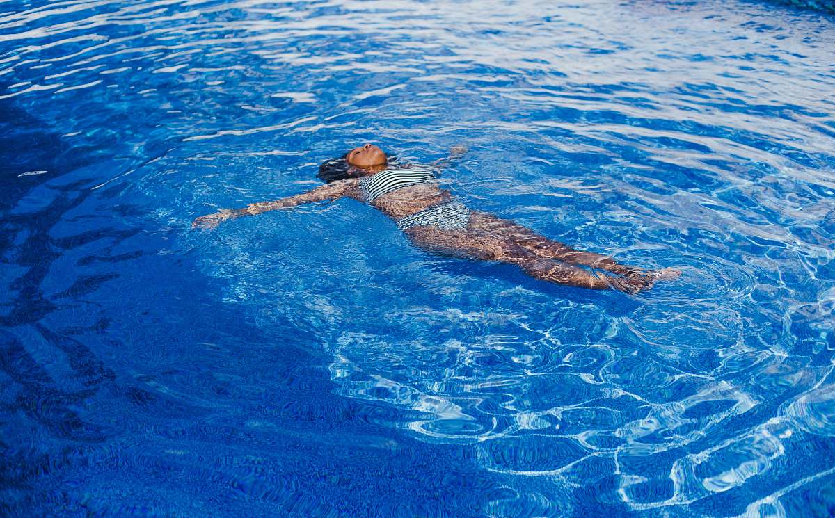 human woman swimming on pool swimming