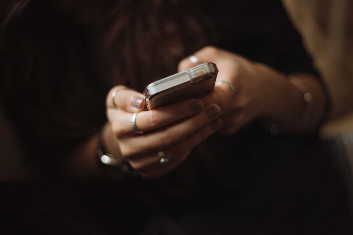 hand person using smartphone ring